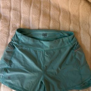 Girls size 14 blue athletic shorts with pockets